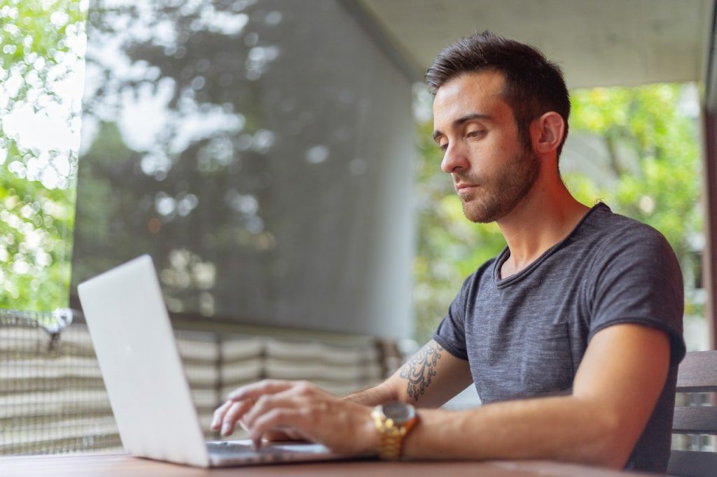 man using laptop